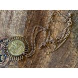 An 1886 Young Victorian Head full sovereign coin, Fitted within a 9ct gold pendant and comes with