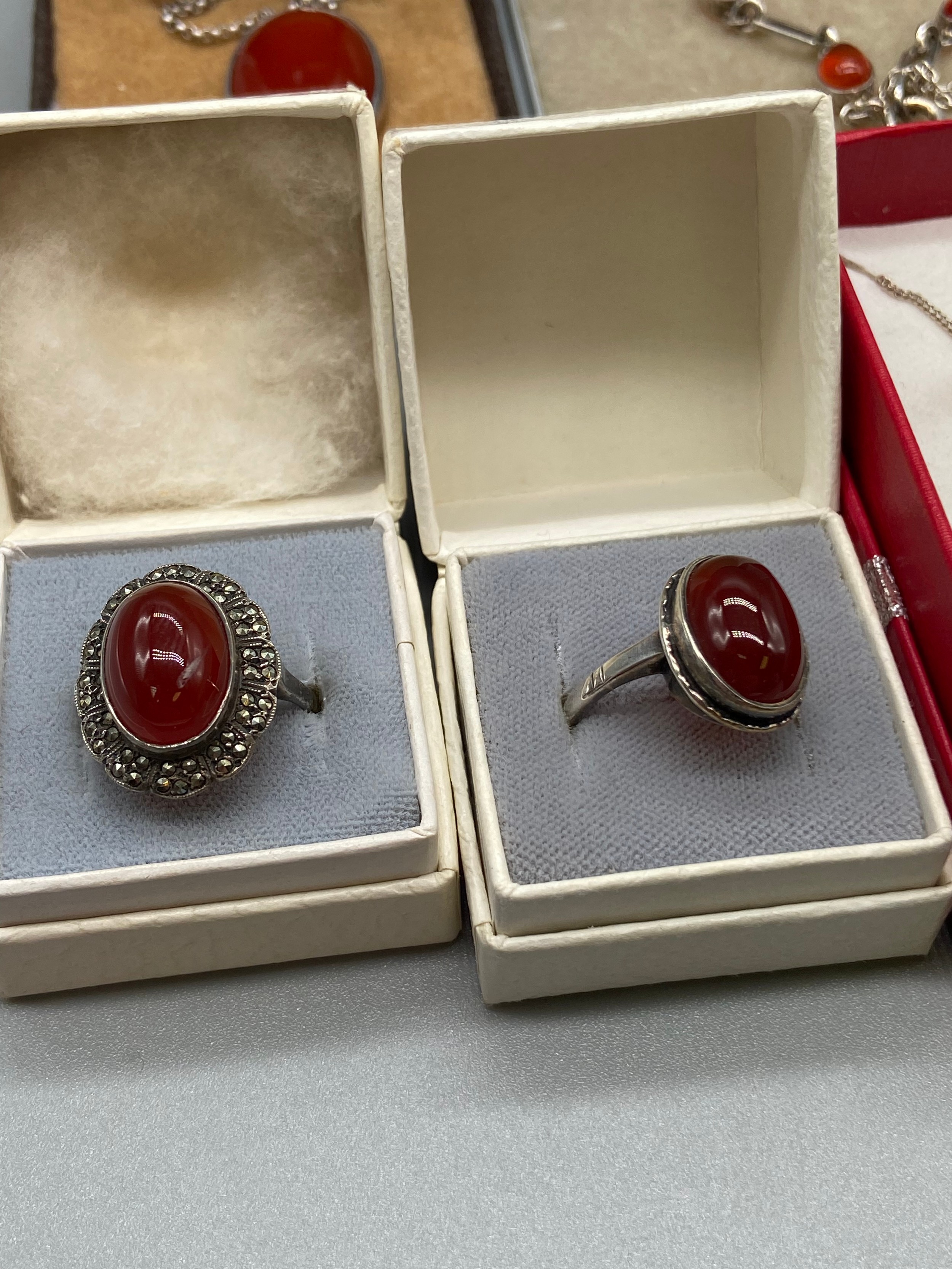 A Selection of Amber and Red stone silver jewellery to include Rings, bracelets and earring sets - Image 2 of 5