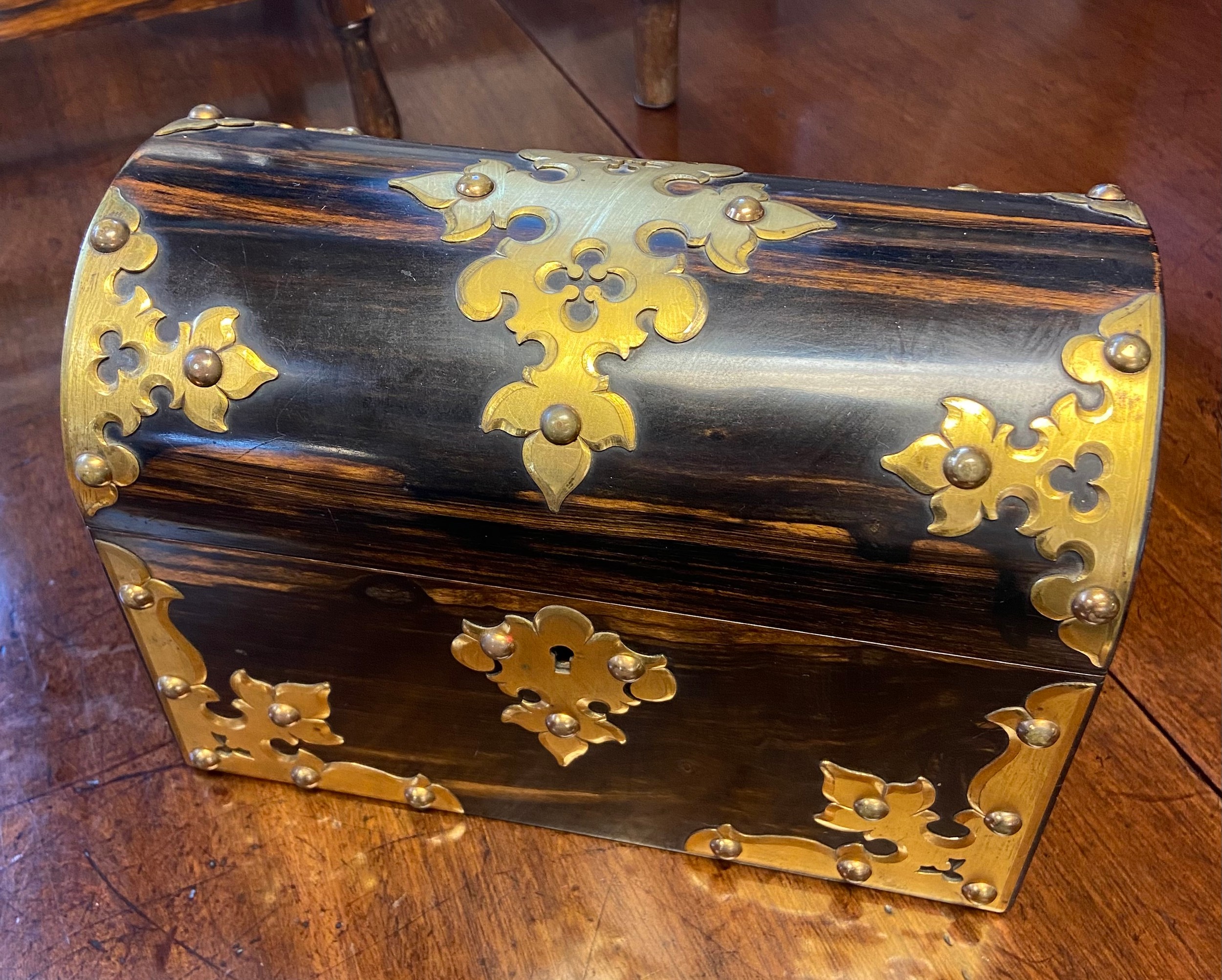 Victorian dome-lid tea caddy, with decorative brass embellishments