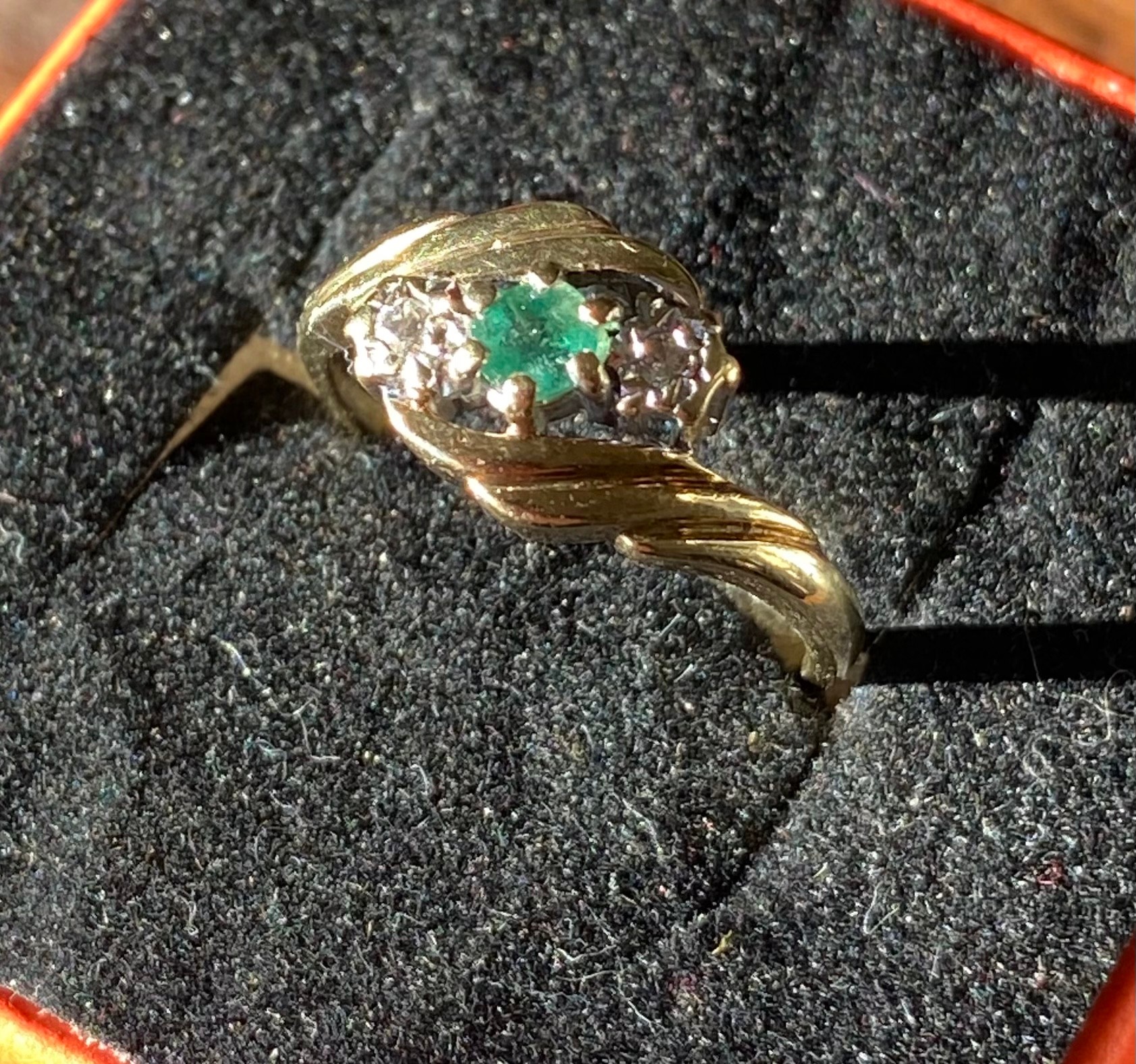 An 9ct yellow gold ladies ring set with a single emerald and two single diamonds [Ring size L] [2. - Image 2 of 3