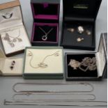 A Selection of silver jewellery to include pearl ring, earring and pendant set. Kit Heath pendant