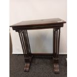 19th century nest of three tables raised on turned supports and downward swept legs [
