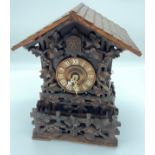 Black Forest cuckoo clock, 19th Century, [Johann Baptist Beha], ornate design with foliate