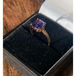An 18ct yellow gold ladies ring set with a Cushion cut Tanzanite stone. [Ring size L] [2.