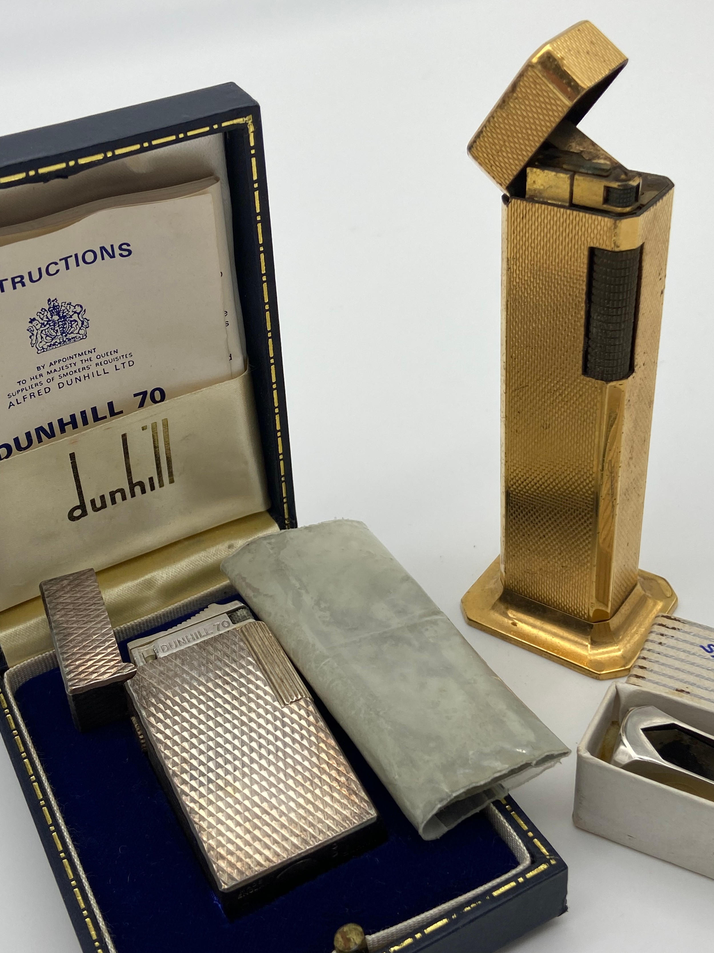 Two vintage Dunhill lighters to include plated Dunhill 70 lighter, box, booklet & Dunhill Tallboy - Image 2 of 3