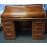 Roll top desk, rectangular top above a pigeon hole storage section above a rectangular writing