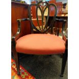 Sheraton style arm chair, pierced splat back with hand painted motif, above a cushioned seat and