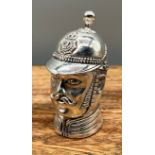 A Substantial silver plated vesta case in the form of a policeman, marked 800. [6cm in length]