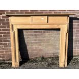 A 19th century pine fire surround