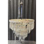 Antique large chandelier, metal body and crystal droplets.