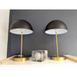 A Pair of contemporary John Lewis Dome top table lamps in Gold and black. Together with a Design