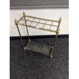 Brass stick stand with cast metal base [56x50x22cm]