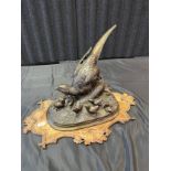Alphonse- Alexandre Arson A Large Bronze sculpture of a Pheasant and her young resting on a