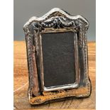 A Birmingham silver easel back picture frame. [10x7cm]
