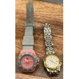 A Ladies Formula 1 Tag Heuer Pink and Grey ladies watch. Serial Number 360.508. Together with a