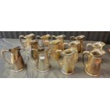 A Collection of 12 Mappin and Webb Plated water ewers / jugs. Engraved with Initials 'P&O'