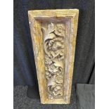 A Large plaster wall panel depicting a floral design. [82x26cm] possibly painted by renowned