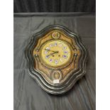 A 19th century French wall clock, alabaster face, enamel roman numeral dial, brass and mother of