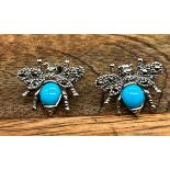 A Pair of 925 silver marcasite and turquoise paneled bug earrings.