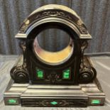 A Victorian weighted slate clock casing. Designed with Malachite inserts and gilt trims. [In Pieces]