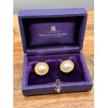 A Pair of 18ct yellow gold and pearl earrings produced by Hamilton & Inches. Comes with original