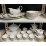 A Large 57 piece Wedgwood [Signet Gold] white and gilt trim dinner set and tea set.