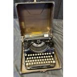 A Vintage portable typewriter.