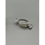 A Silver 'Sweetie' style pill box.