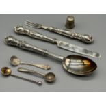 A Lot of silver flatwares to include a matching three piece Georgian Birmingham Spoon, Fork and
