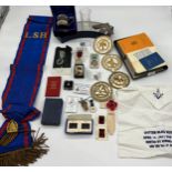 A Collection of Masonic Lodge items to include jewels, books, sash and apron etc