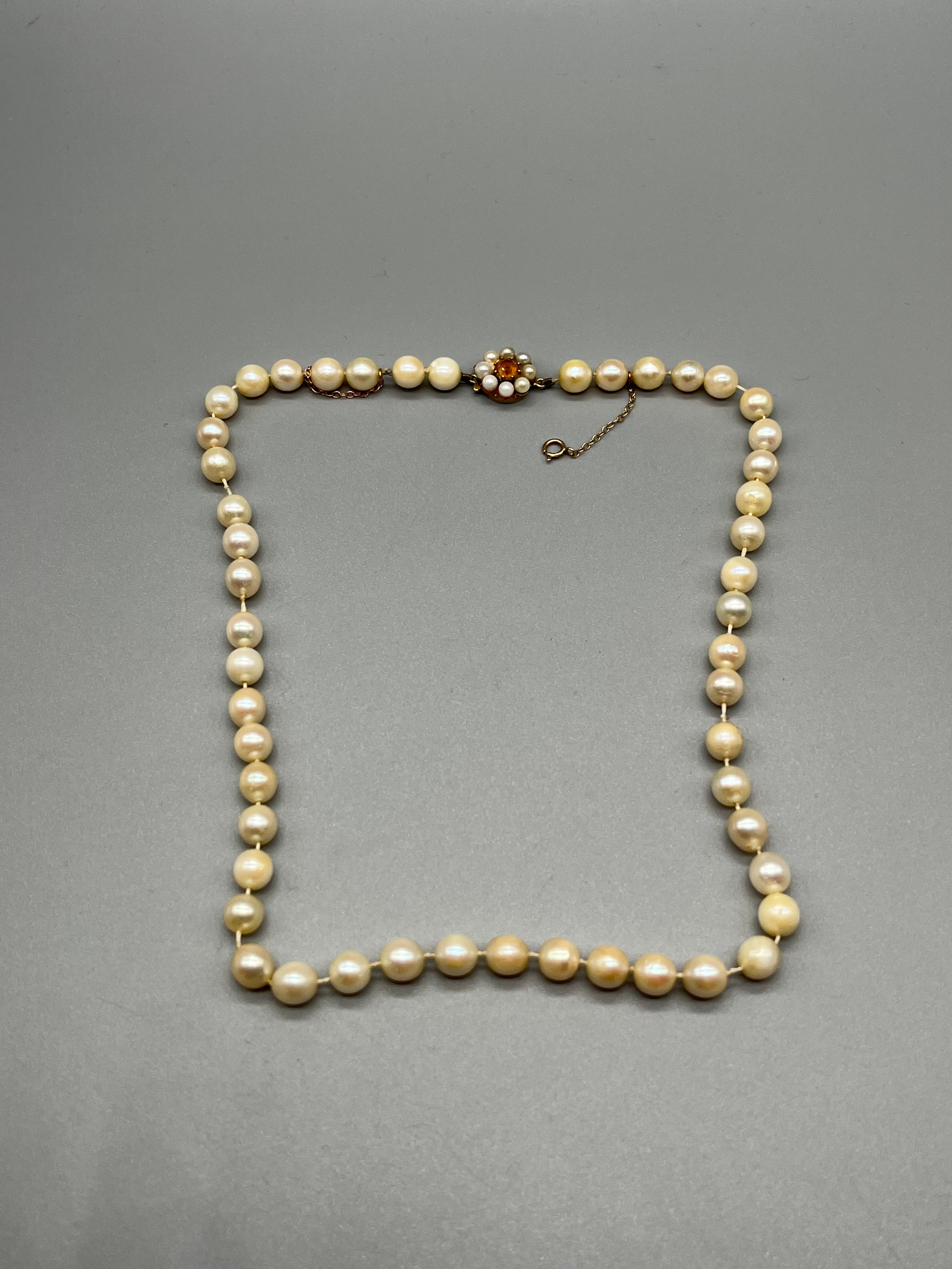 Antique ladies pearl necklace set with a 9ct gold, citrine and pearl clasp.