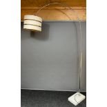 A Possible Harvey Guzzini floor standing lamp. Marble base and chrome body. Comes with material