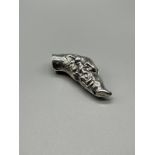 A Boar head walking cane handle stamped Sterling. [8cm length]