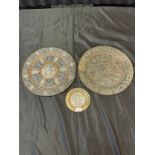 A Lot of three 19th century middle east ornate plaques, silver, brass and copper designs. Showing