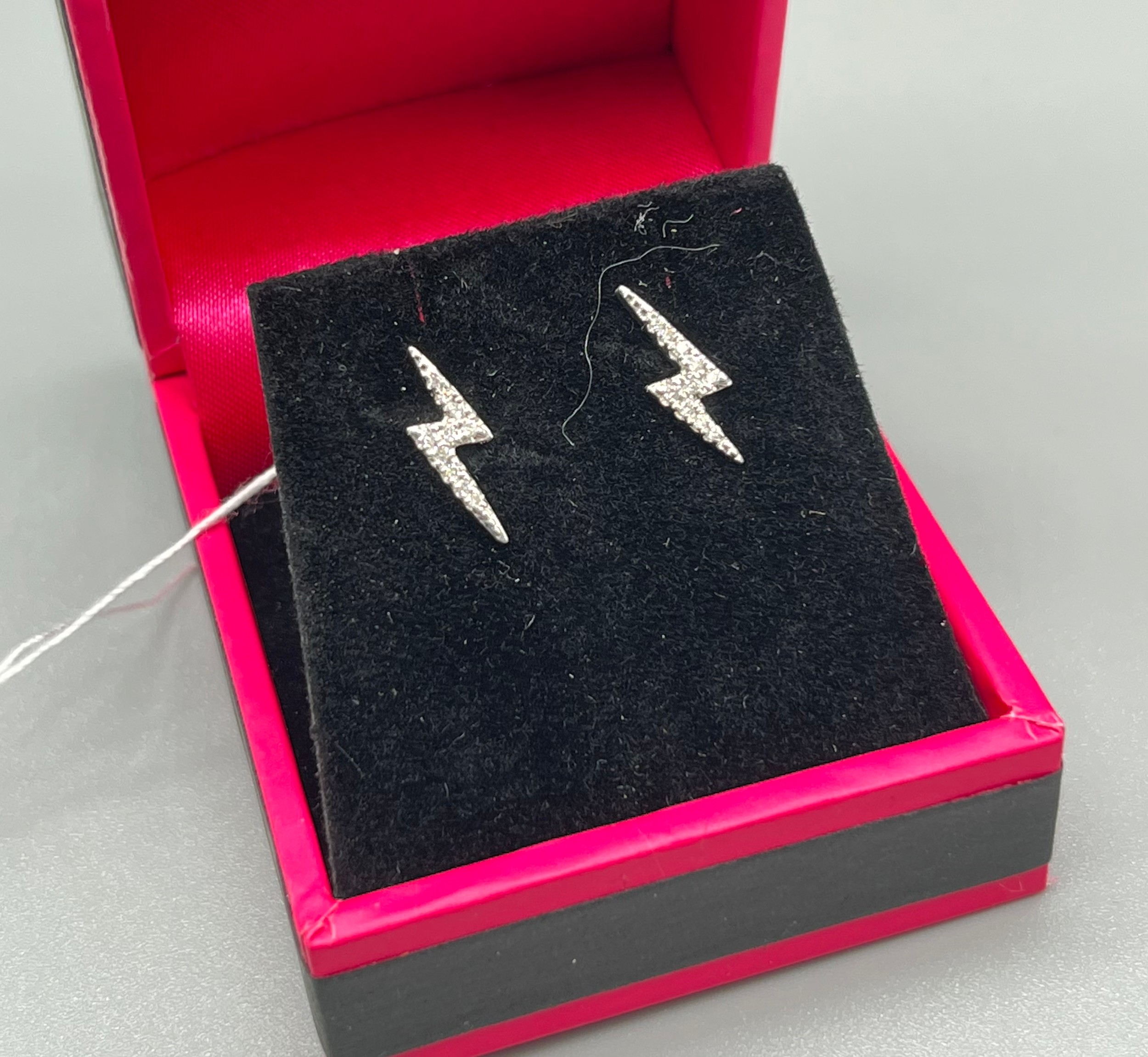 A Pair of 18ct white gold diamond set lightning earrings.