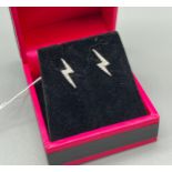 A Pair of 18ct white gold diamond set lightning earrings.