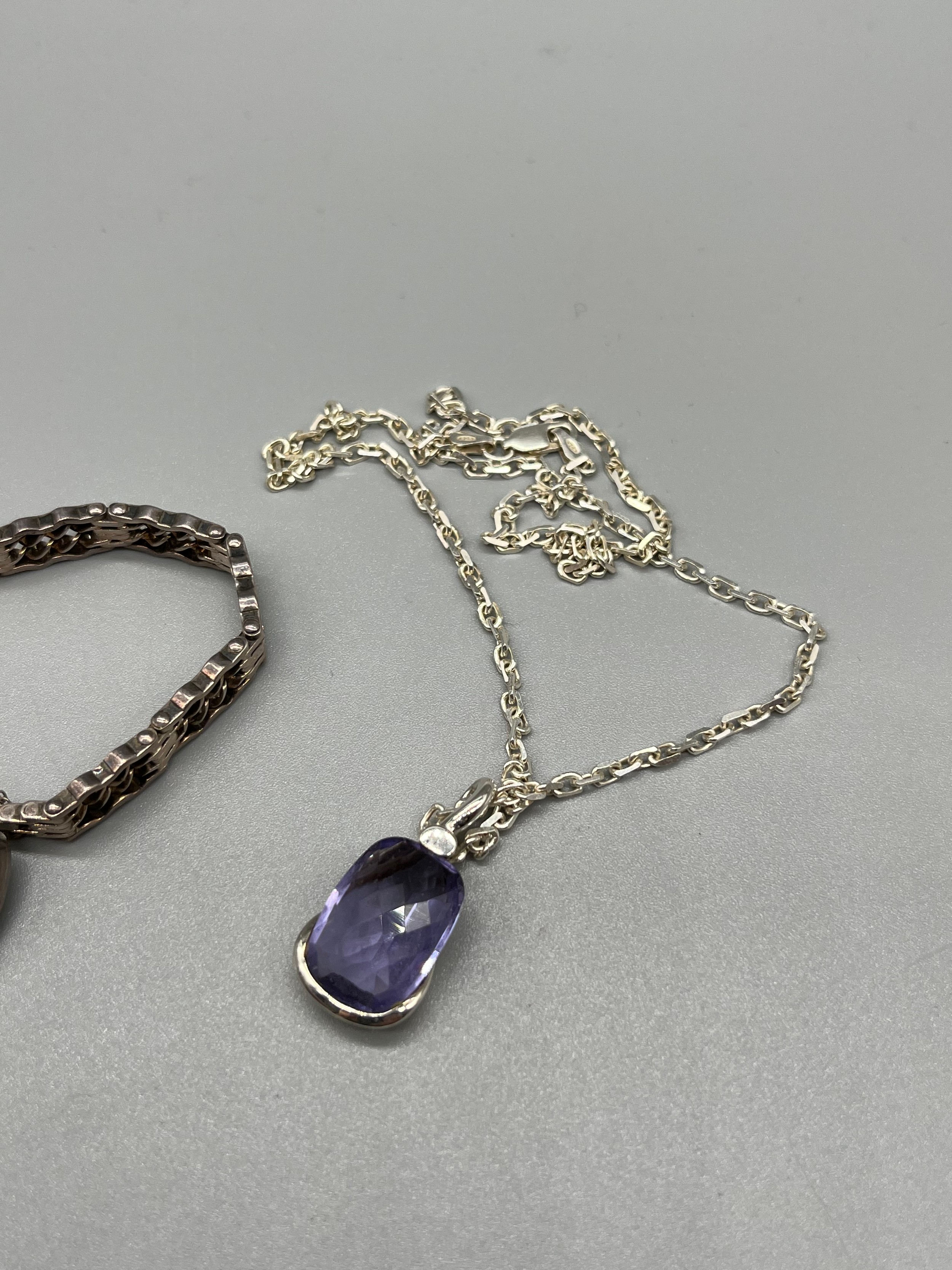 A Silver bracelet with heart lock attached, together with a silver and purple stone pendant with - Image 3 of 3