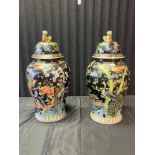 A Large pair of Chinese Da Qing Jiaqing Nian Zhi highly decorated hand painted vases with lids,