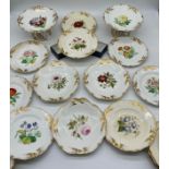 A 19th century hand painted desert service consisting of two tazzas and service plates. All hand