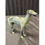 Antique bronze green patina greyhound sculpture. [30x38cm]