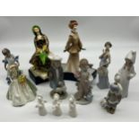 A Selection of Royal Doulton, Tuscan and Lladro figurines.