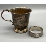 A Birmingham silver christening mug and Birmingham silver napkin ring. [81.41grams]