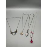 A Lot of four vintage silver ladies necklaces. Includes a Wedgwood cameo and marcasite pendant