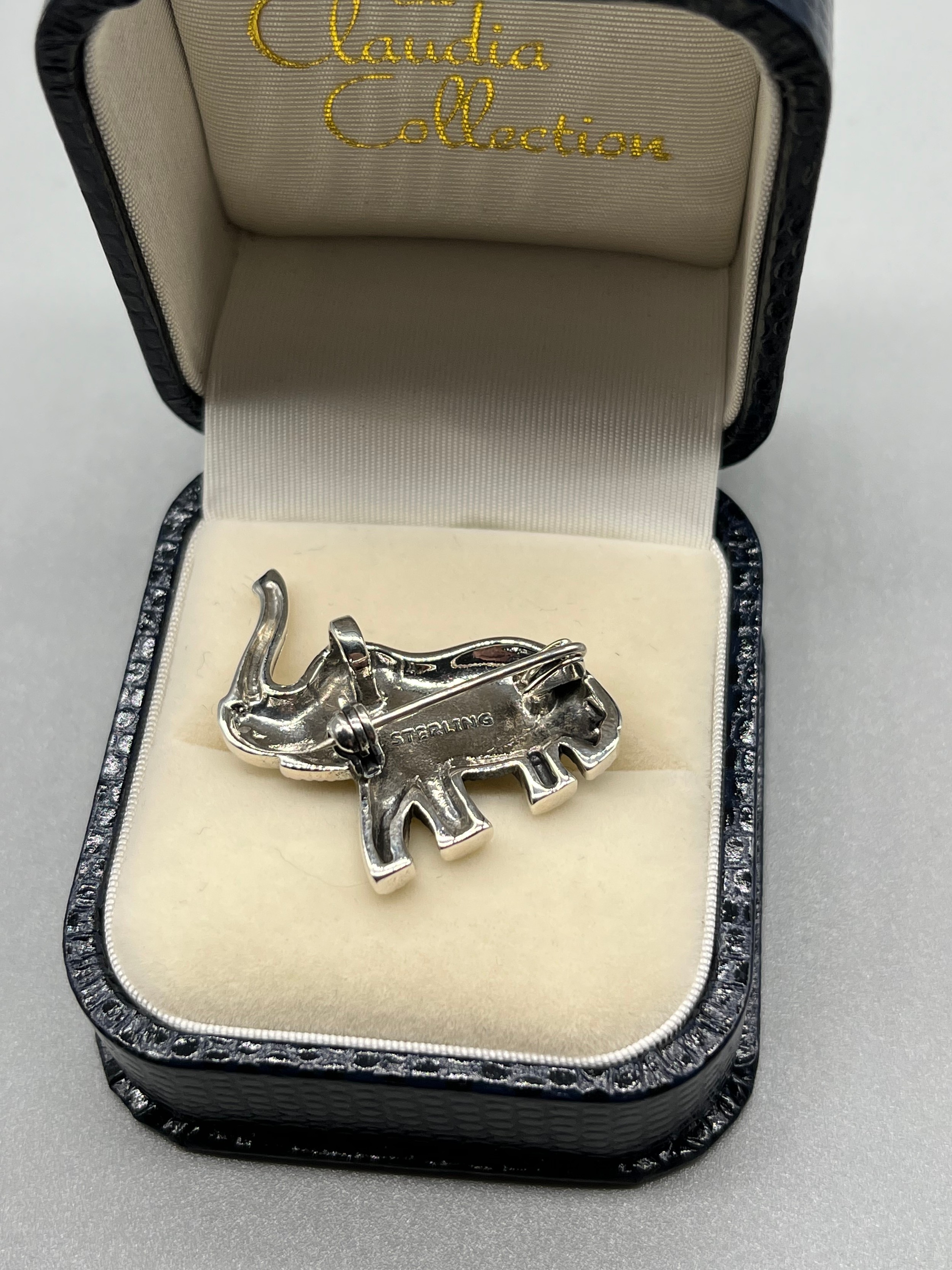 A Silver and marcasite elephant brooch/ pendant. - Image 2 of 2