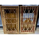 A Pair of antique French windows, Wooden frame, Cast iron grate and glass panels. [121x68cm]