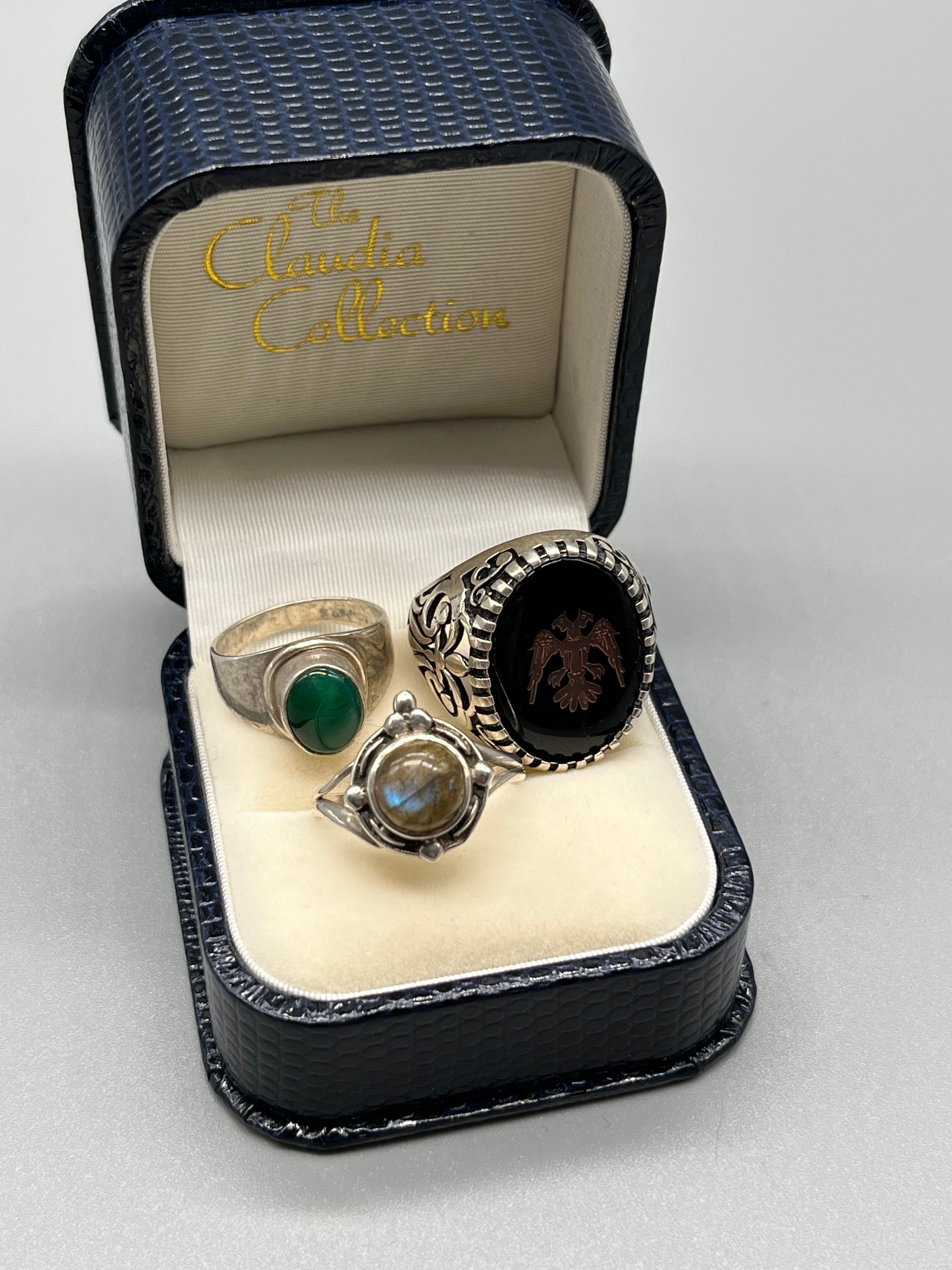 A Lot of three various silver rings. Includes three various stones to each.