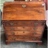 A Georgian mahogany four drawer writing bureau [107x91x50cm]