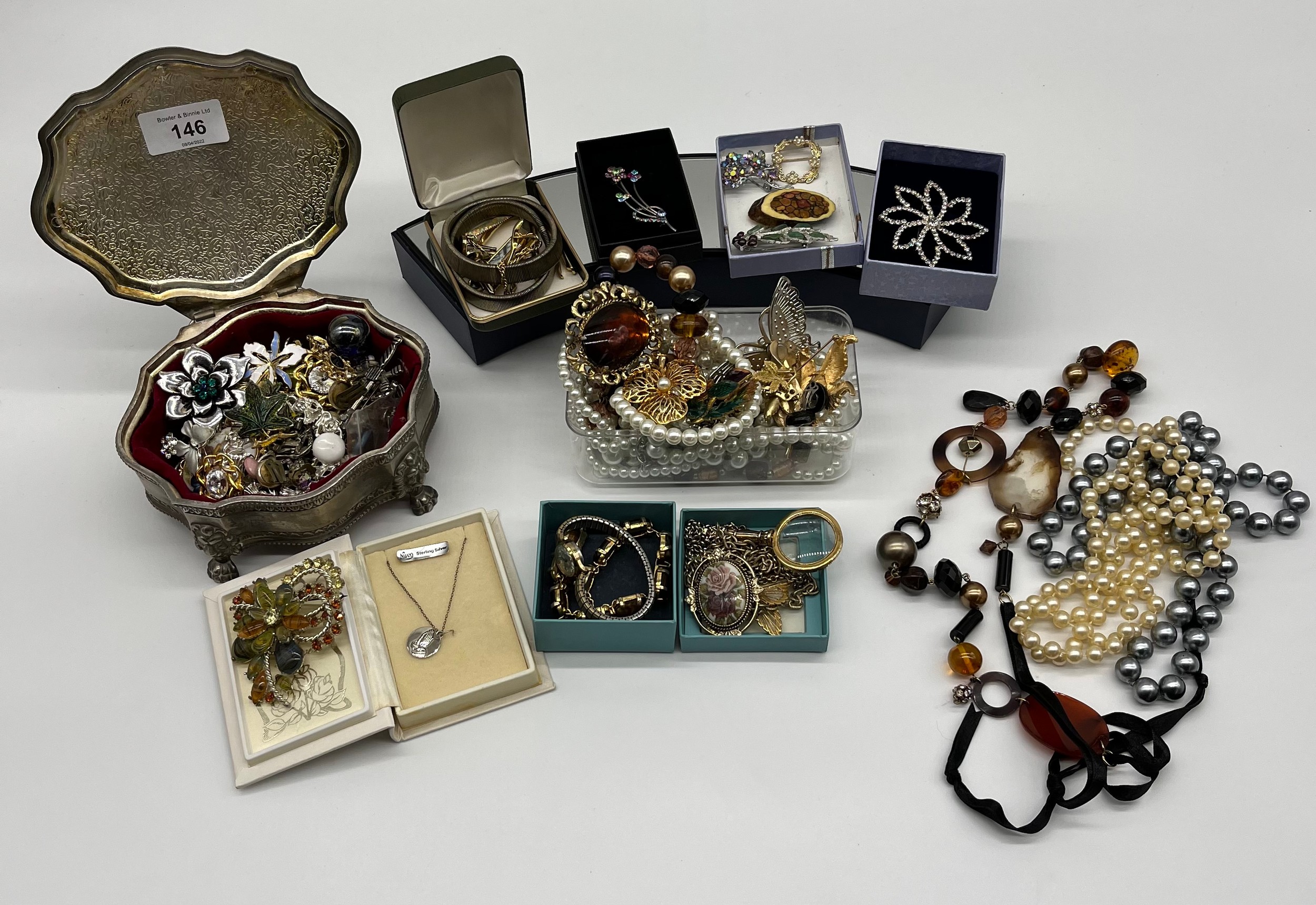 A Selection of costume jewellery necklaces and brooches