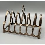 A London silver 6 slice toast rack [76.82grams]