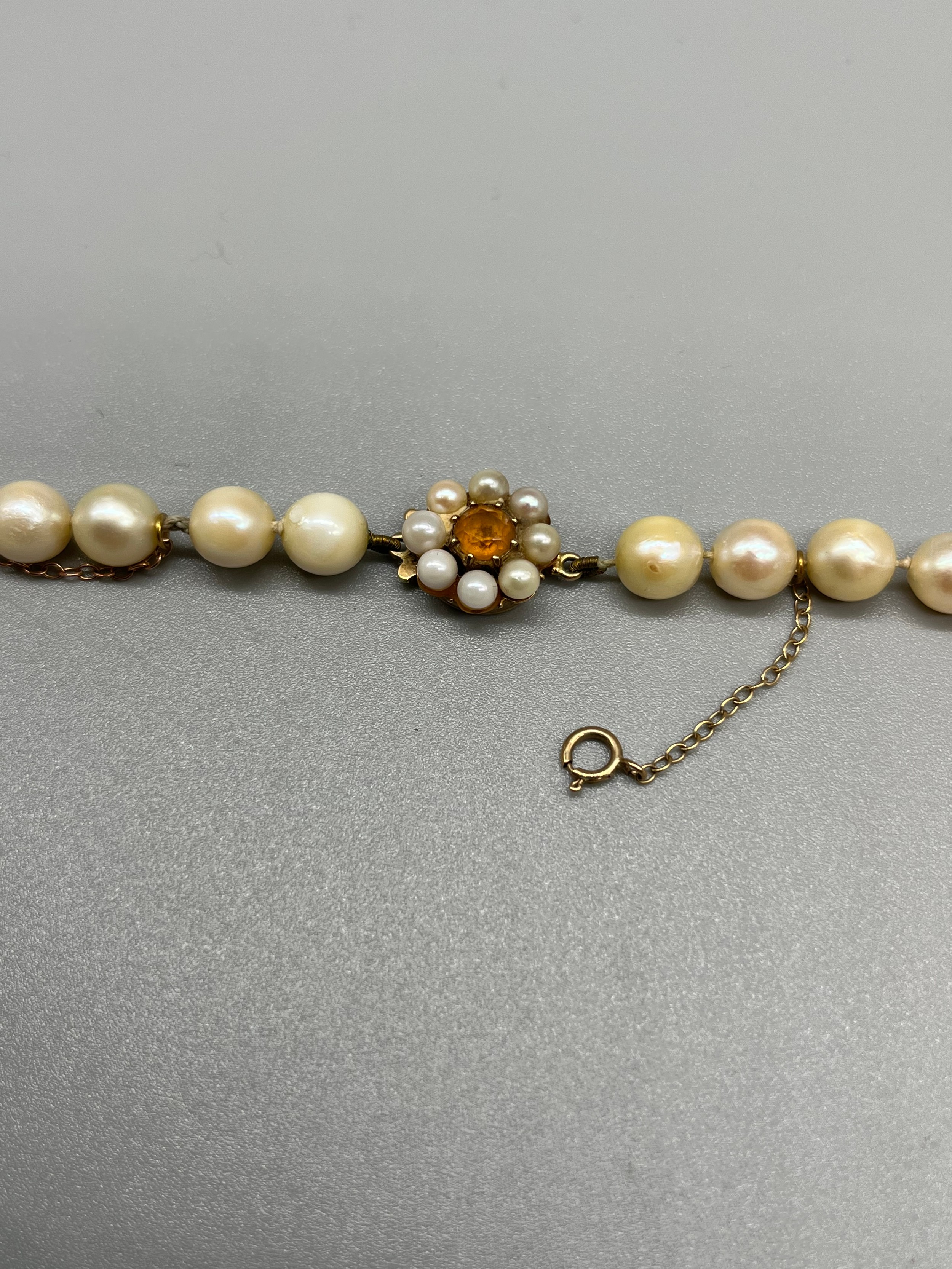 Antique ladies pearl necklace set with a 9ct gold, citrine and pearl clasp. - Image 2 of 3